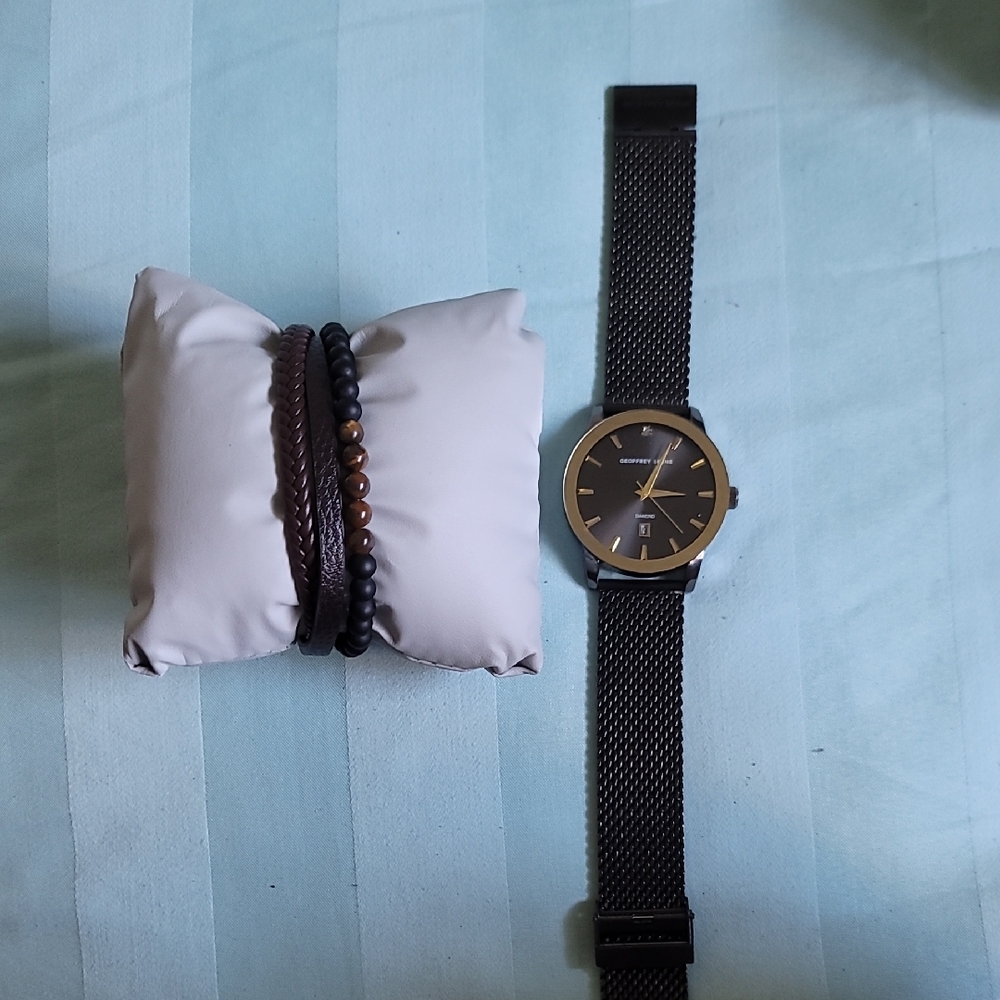 Geoffrey Beene Black and Gold Watch with Brown and Black Bracelets